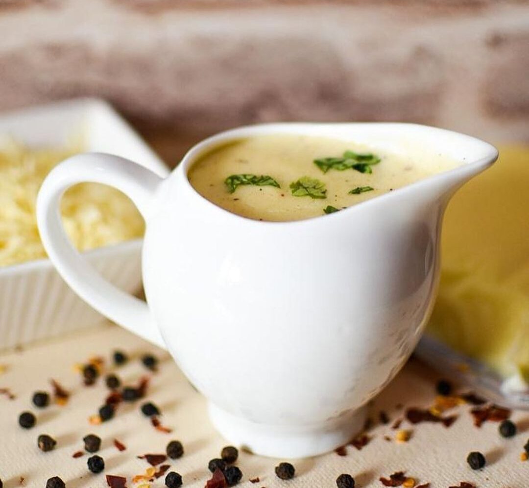 Cup of cheese sauce